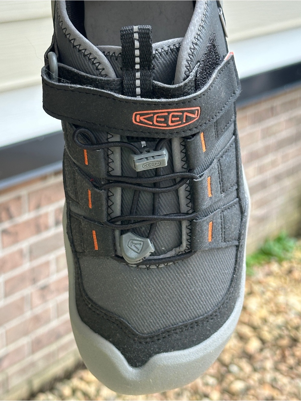 KEEN boy’s Black and Orange Outdoor Sandal-Sneaker